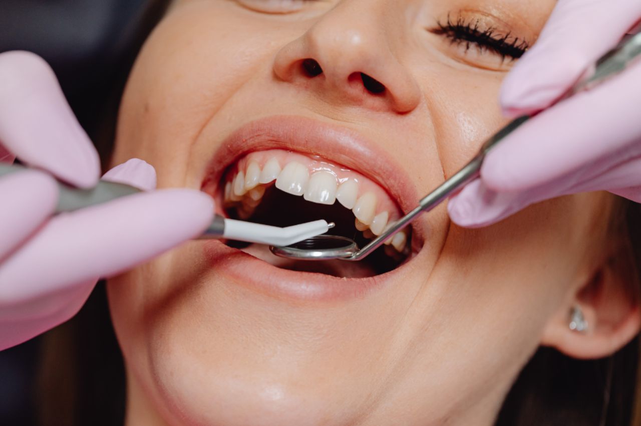 women-getting-teeth-cleaned woman getting teeth cleaned